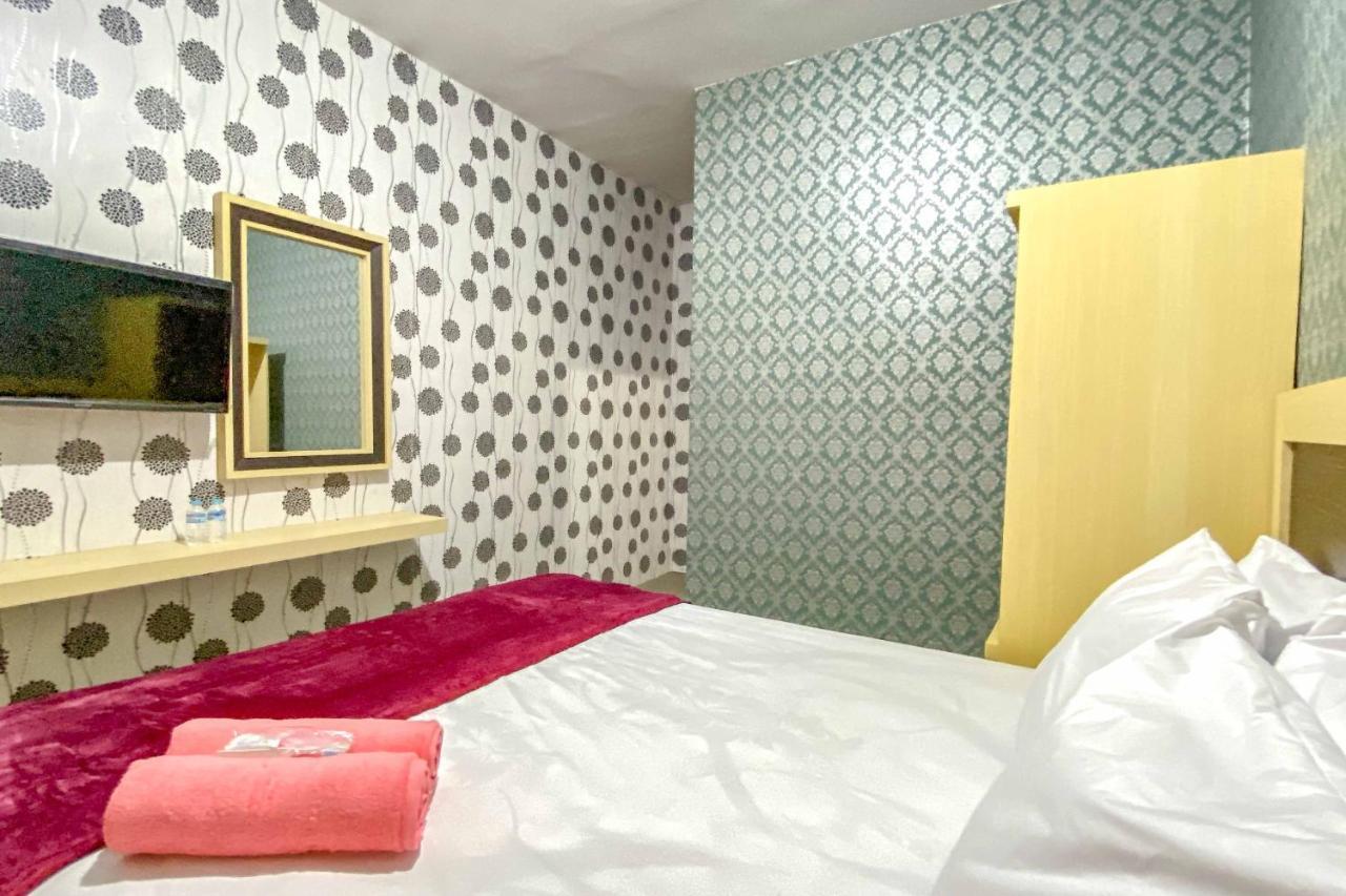 Tini'S Guest House Malang Mitra Reddoorz Bagian luar foto