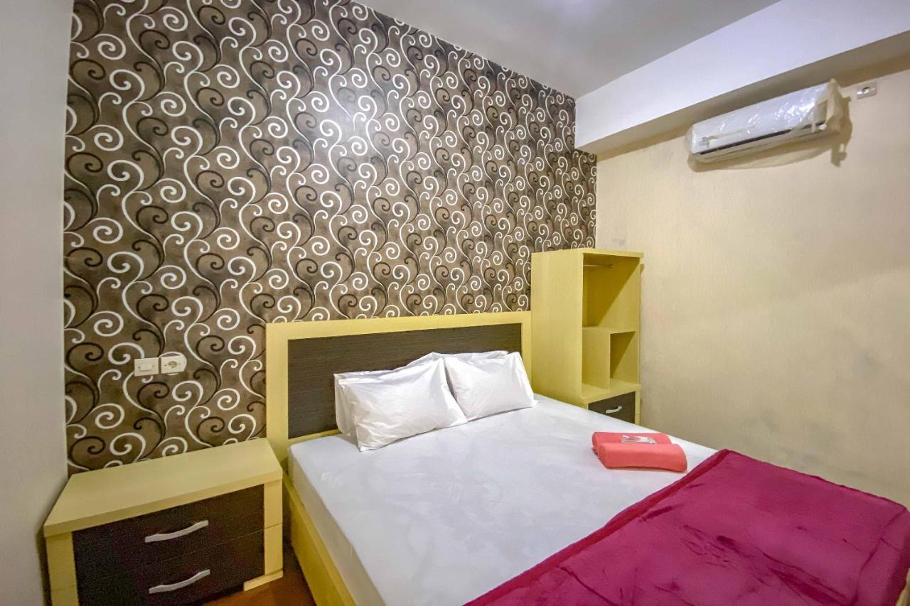 Tini'S Guest House Malang Mitra Reddoorz Bagian luar foto
