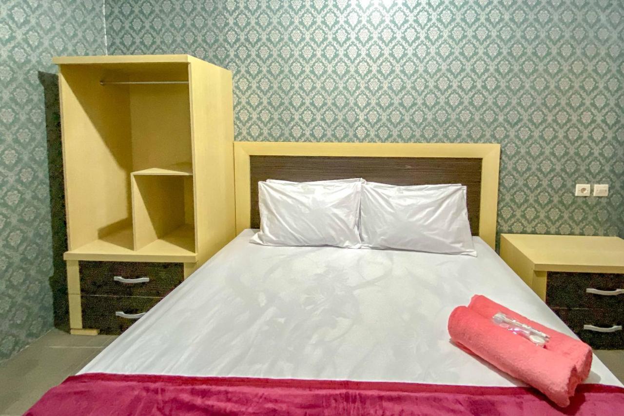 Tini'S Guest House Malang Mitra Reddoorz Bagian luar foto