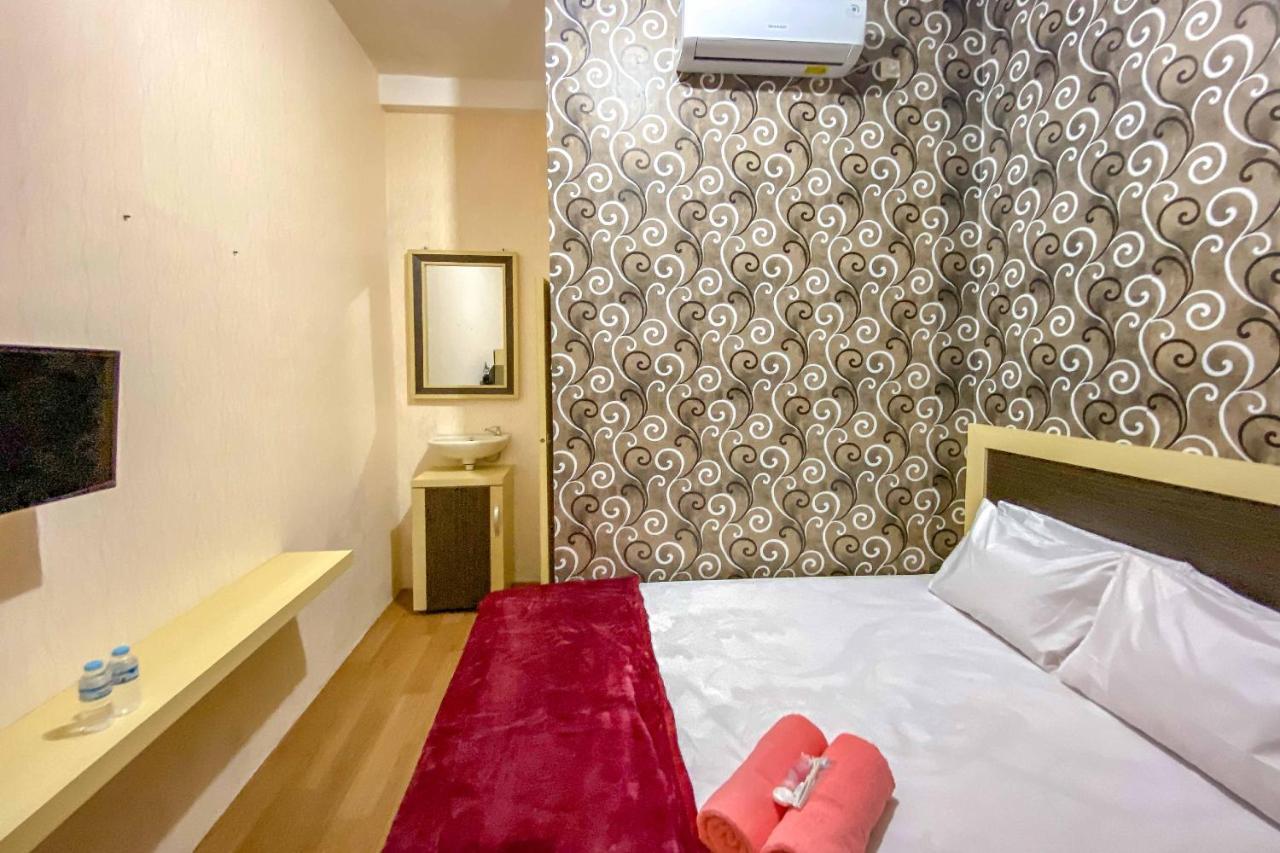 Tini'S Guest House Malang Mitra Reddoorz Bagian luar foto