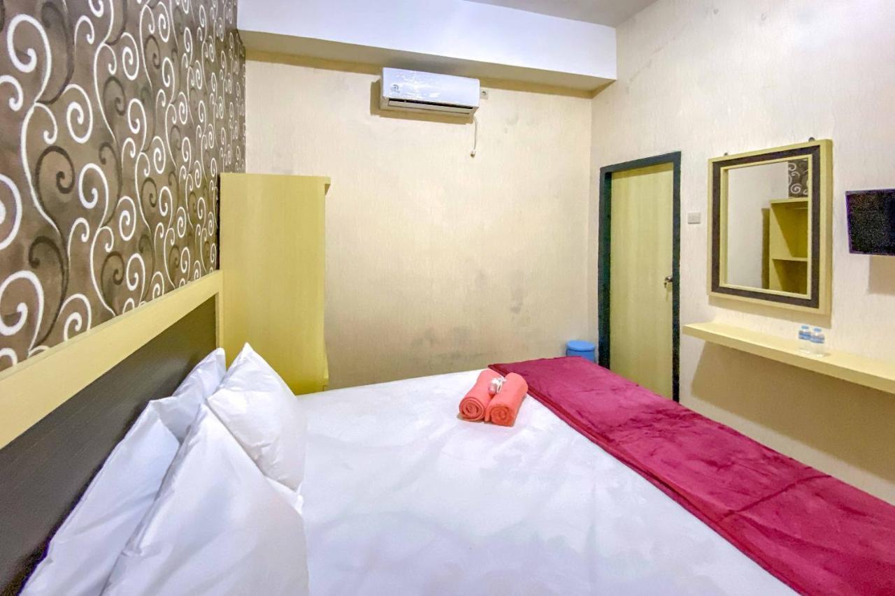 Tini'S Guest House Malang Mitra Reddoorz Bagian luar foto