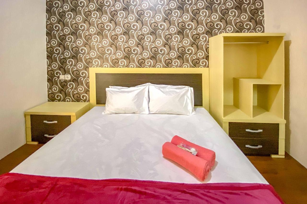 Tini'S Guest House Malang Mitra Reddoorz Bagian luar foto
