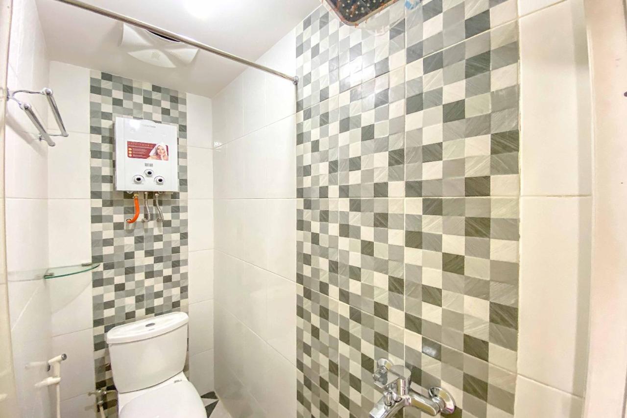 Tini'S Guest House Malang Mitra Reddoorz Bagian luar foto