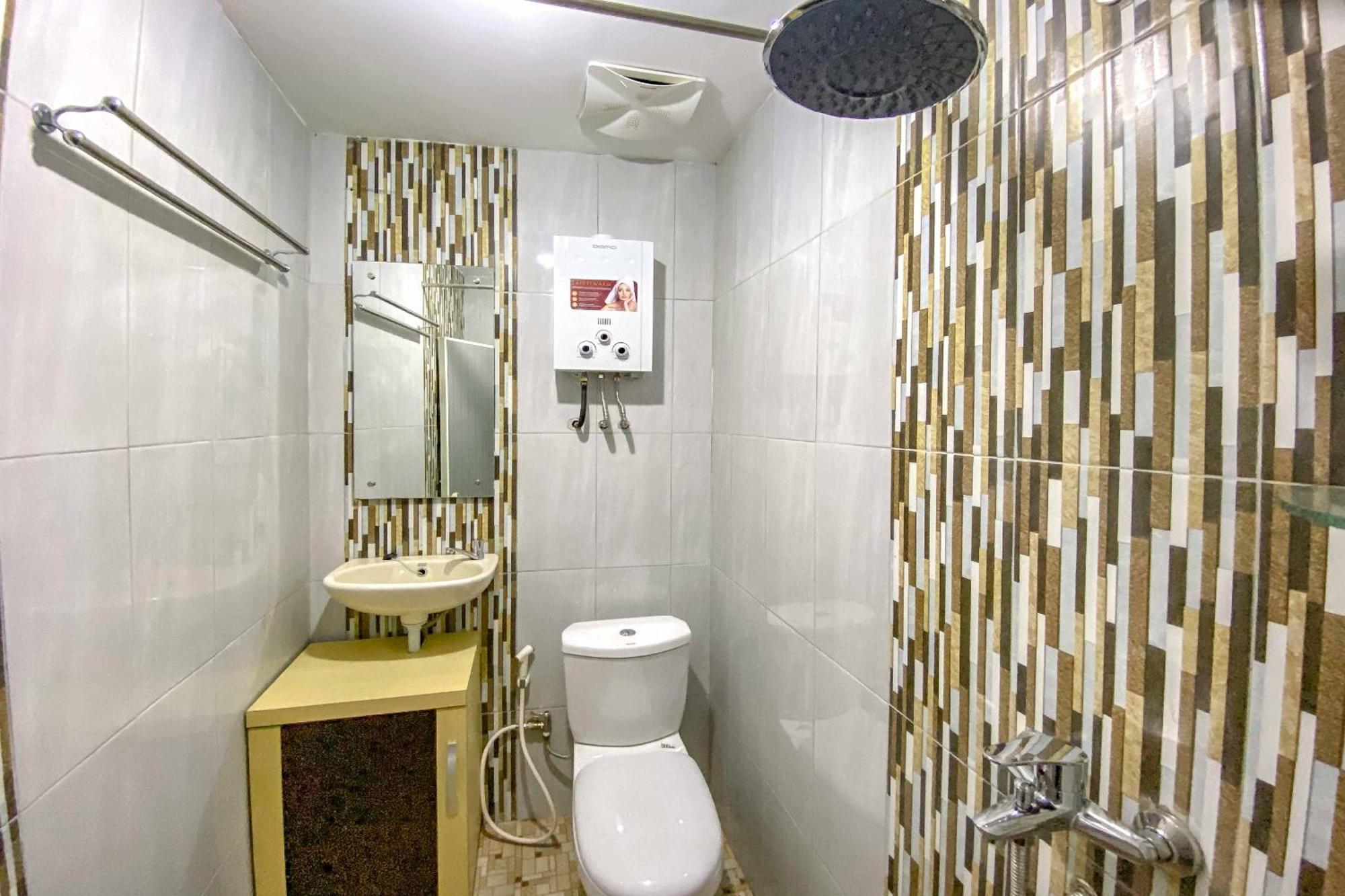 Tini'S Guest House Malang Mitra Reddoorz Bagian luar foto