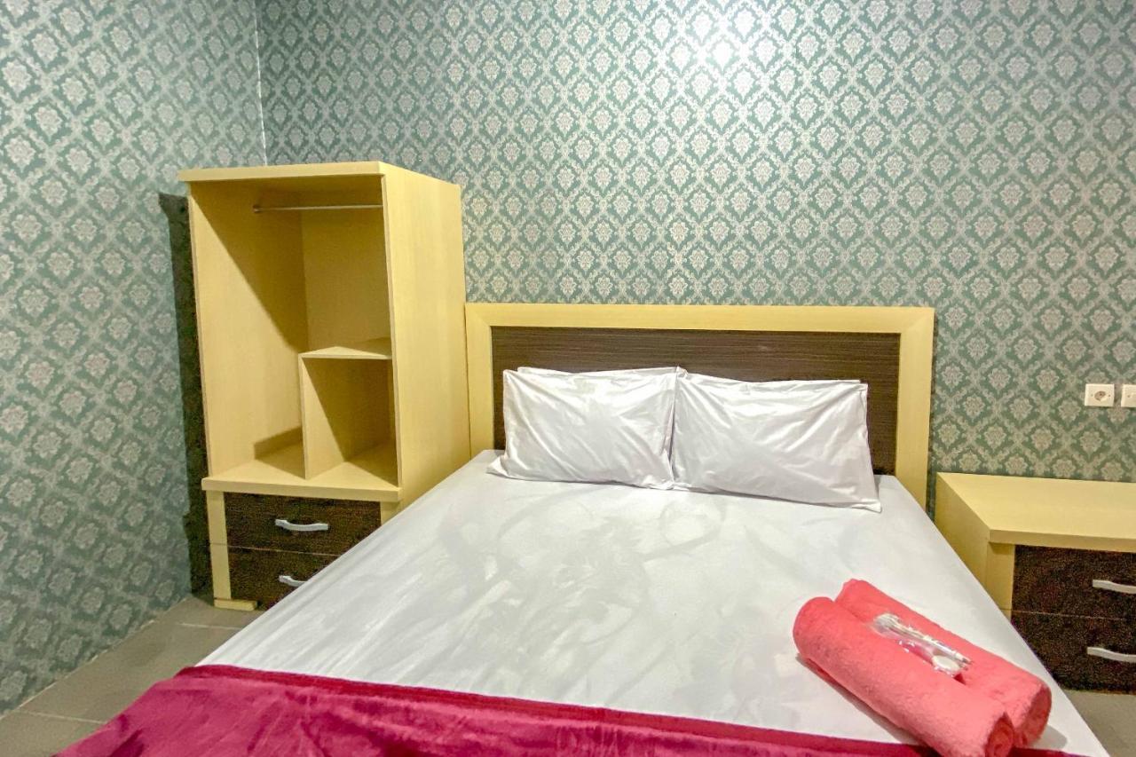 Tini'S Guest House Malang Mitra Reddoorz Bagian luar foto