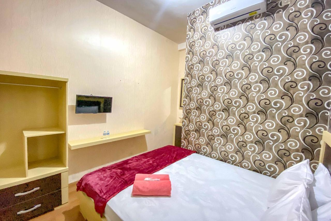 Tini'S Guest House Malang Mitra Reddoorz Bagian luar foto