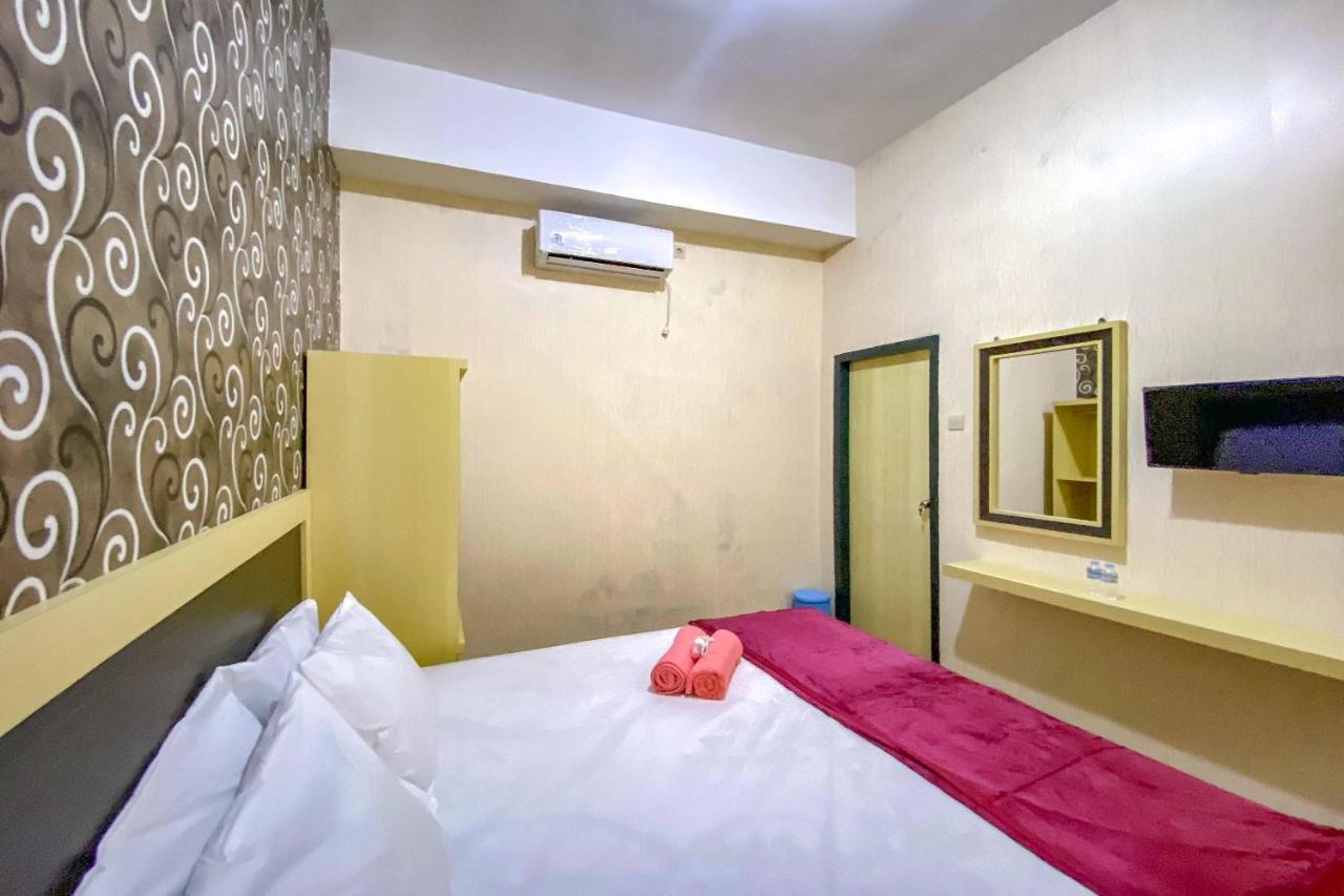 Tini'S Guest House Malang Mitra Reddoorz Bagian luar foto