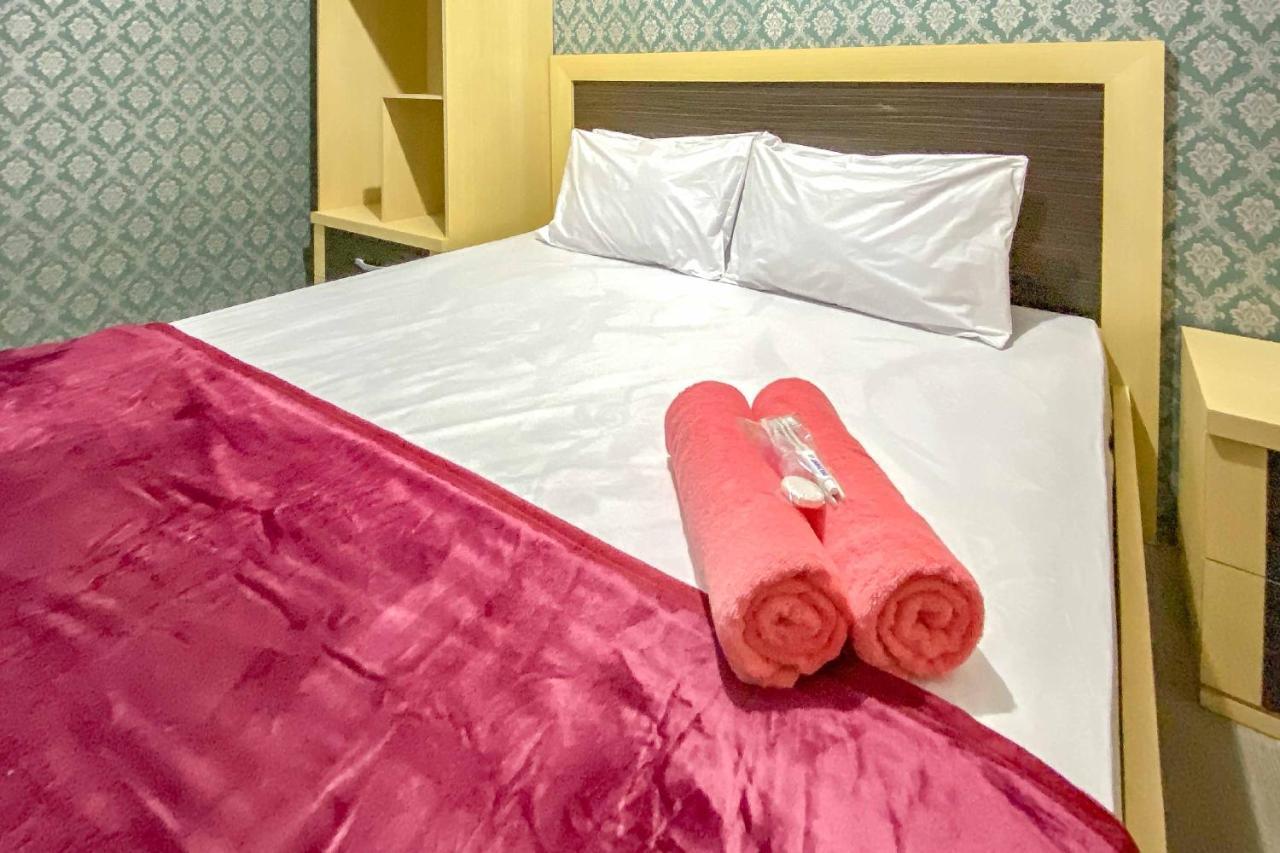 Tini'S Guest House Malang Mitra Reddoorz Bagian luar foto