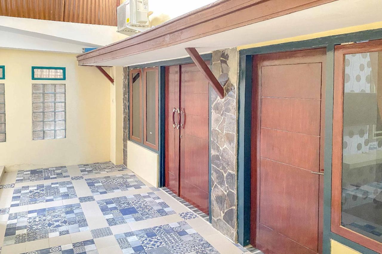 Tini'S Guest House Malang Mitra Reddoorz Bagian luar foto
