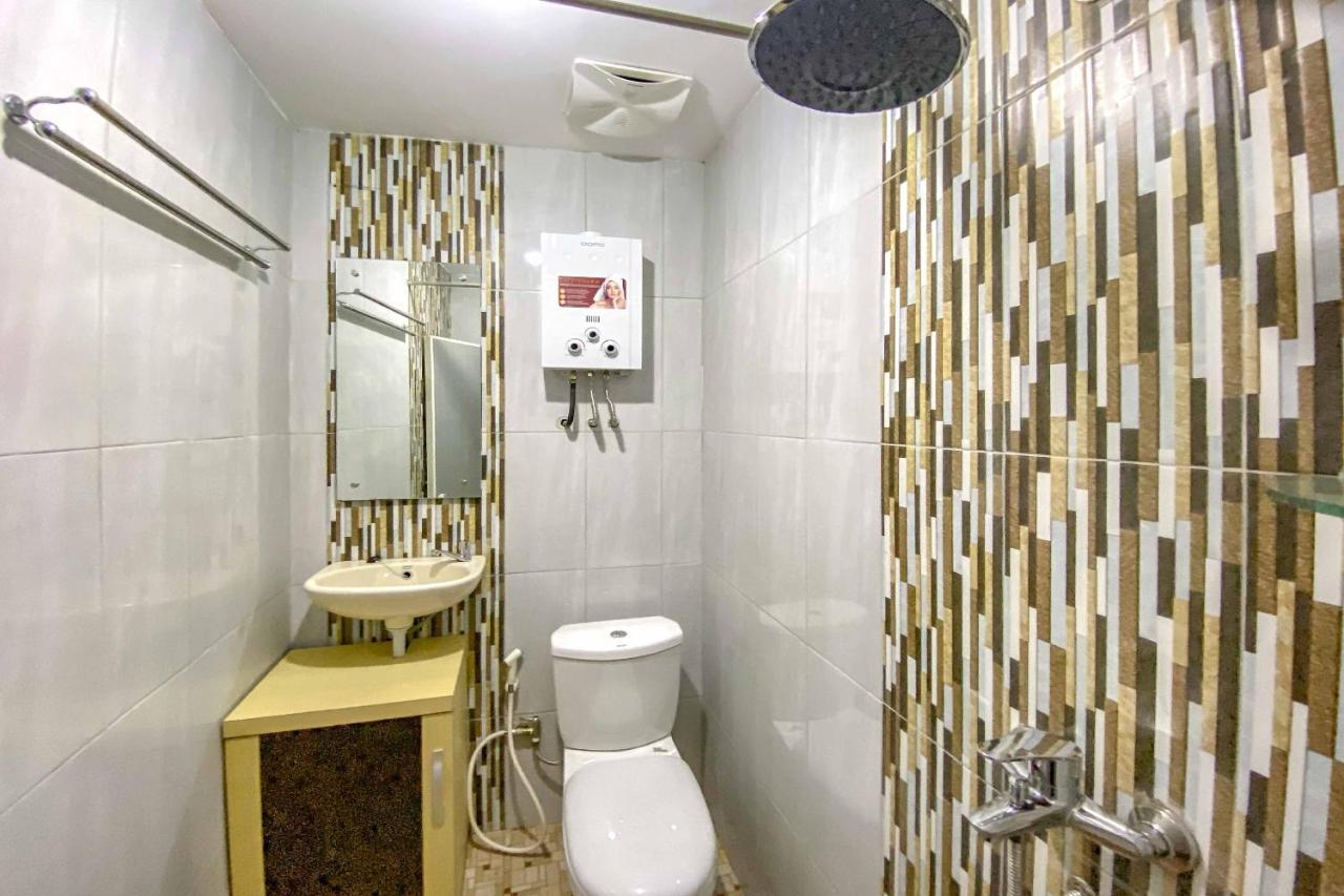 Tini'S Guest House Malang Mitra Reddoorz Bagian luar foto