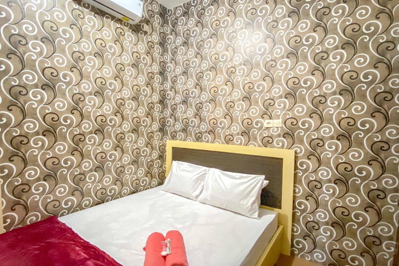 Tini'S Guest House Malang Mitra Reddoorz Bagian luar foto